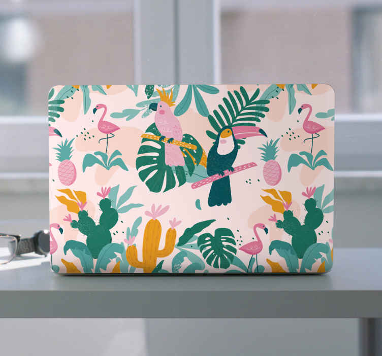 Vinilo para portátiles Pájaros verdes y hojas sobre fondo rosa - TenVinilo