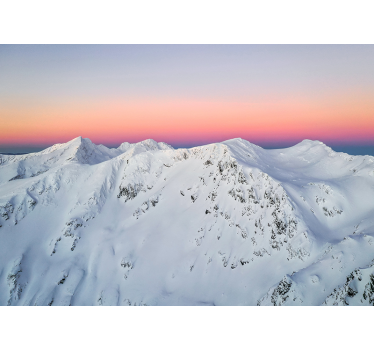 Papel mural montaña atardecer en picos nevados - TenVinilo