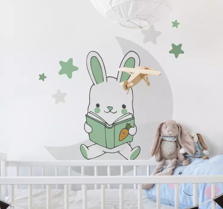 Vinilo ilustración Conejo leyendo en la luna colores verdes - TenVinilo