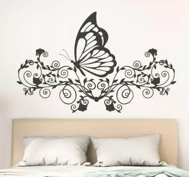 Vinilo decorativo cabecero mariposa en flores - TenVinilo