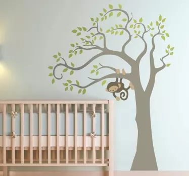 Vinilo infantil decorativo mono en árbol - TenVinilo