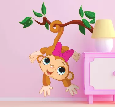 Vinilo infantil mona con lazo rama - TenVinilo