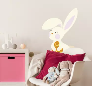 Vinilo para casa conejo de Pascua con huevo - TenVinilo