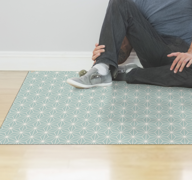 Alfombra vinílica geométrica explosión de estrella verde - TenVinilo