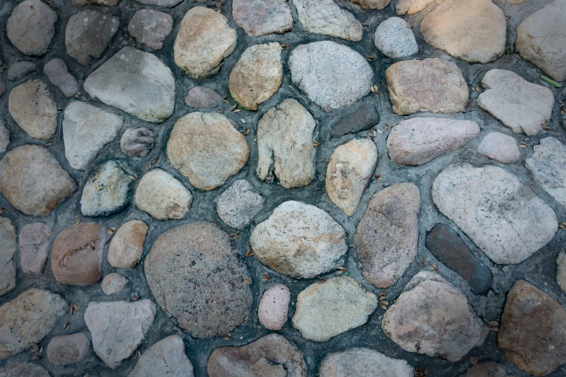 Alfombra vinílica imitación piedra camino de guijarros - TenVinilo
